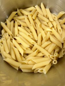 one pound of freshly cooked penne pasta